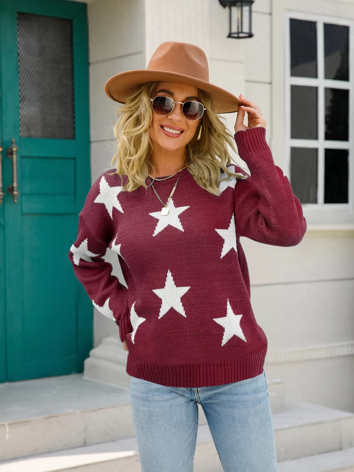 Celebrate America in style this Fourth of July with our Star Round Neck Dropped Shoulder Sweater – perfect for Independence Day festivities and patriotic gatherings