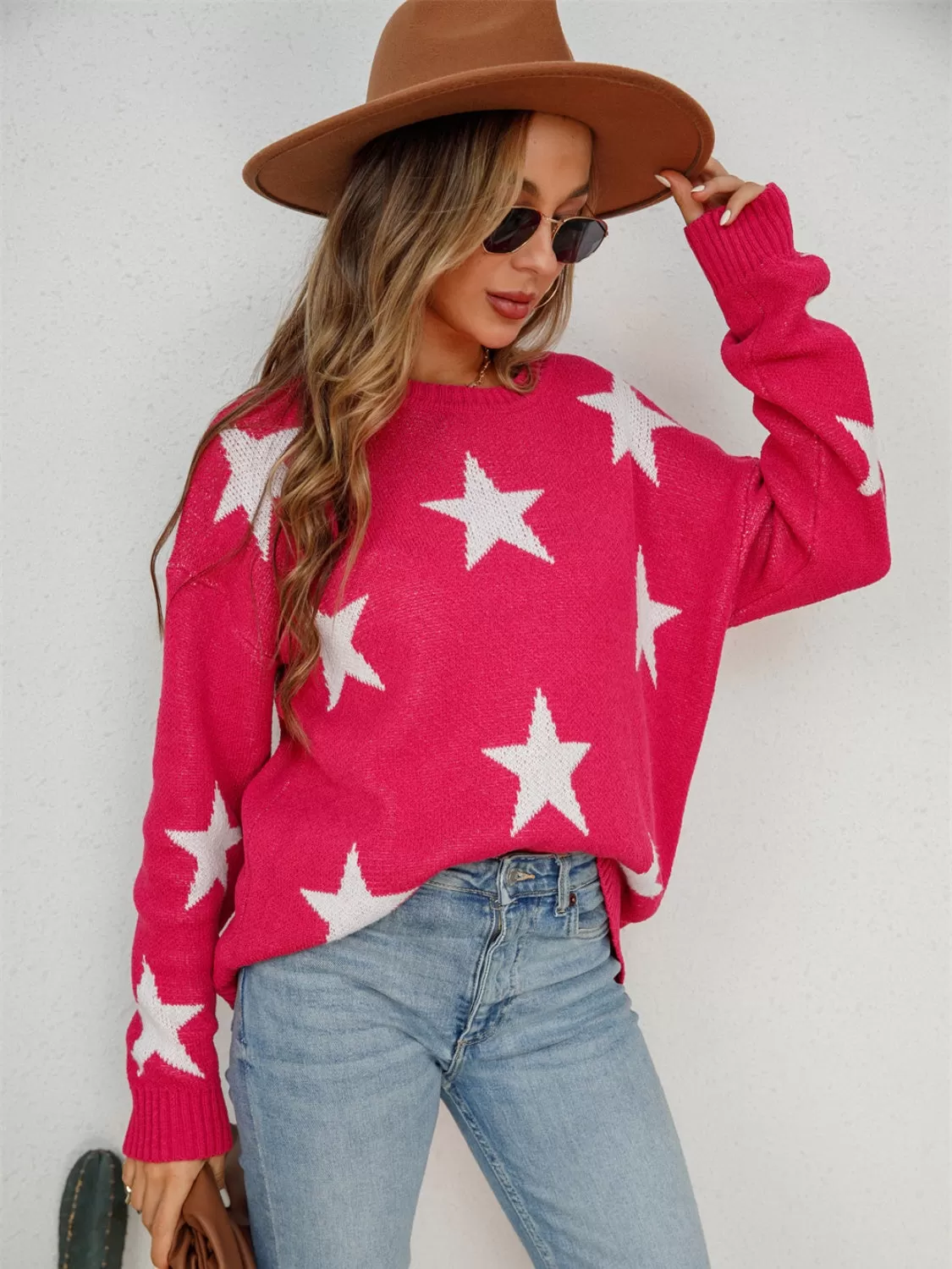 Celebrate America in style this Fourth of July with our Star Round Neck Dropped Shoulder Sweater – perfect for Independence Day festivities and patriotic gatherings